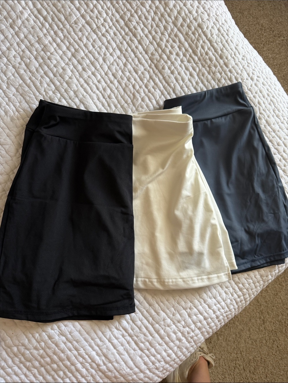 Three Skorts in Black, White, and Charcoal